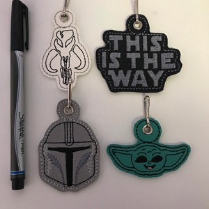 Mandalorian inspiriert Reißverschluss zieht.