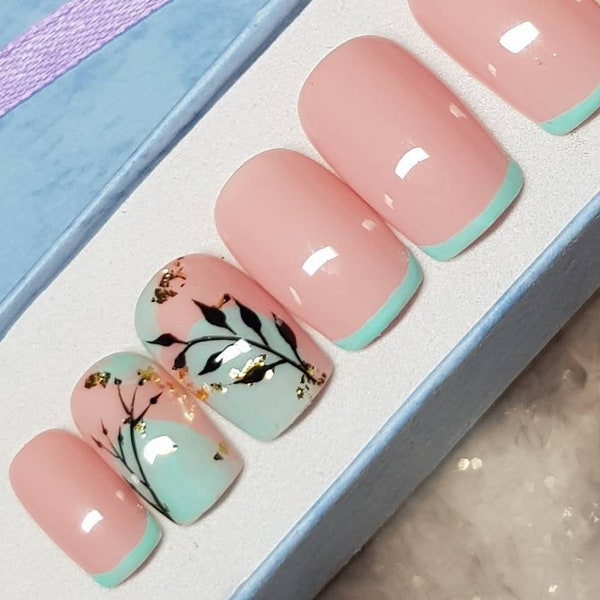 Light Green French style Press on Nails with hand painted floral nail art on Natural Pink background. Different shapes and lengths available