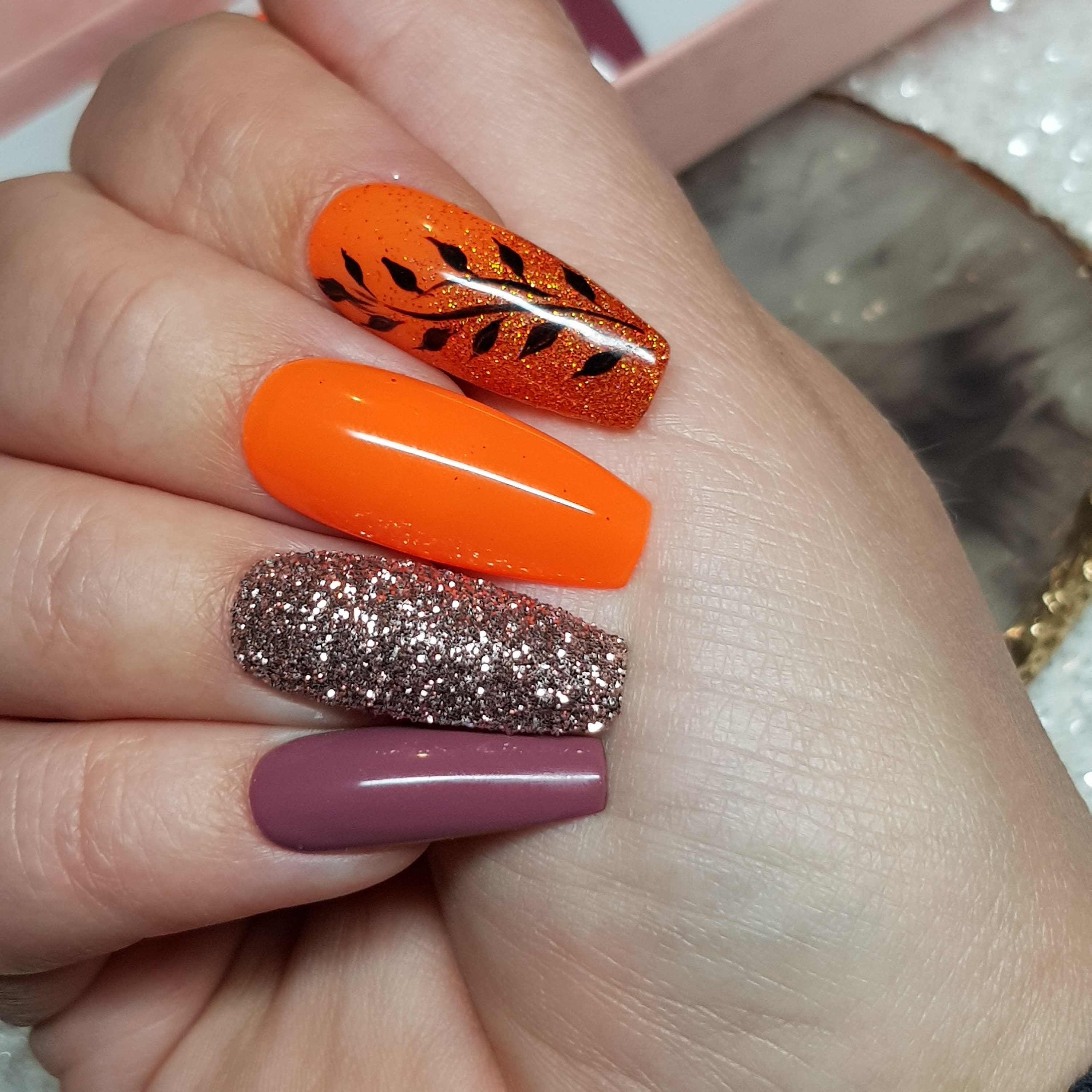 Orange Nails With Glitter And Hand Painted Floral Design Long Etsy India