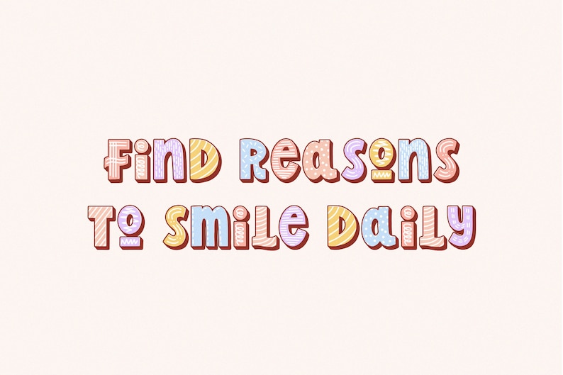 May include: A graphic featuring the phrase "Find Reasons To Smile Daily" in a colourful, decorative font. The letters are outlined in brown and filled with patterns and pastel shades, set against a pale pink background.