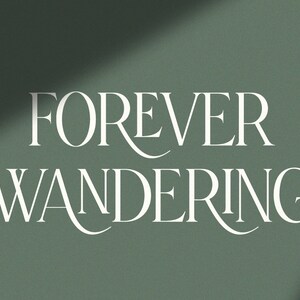 May include: White text on a green background reads "FOREVER WANDERING".