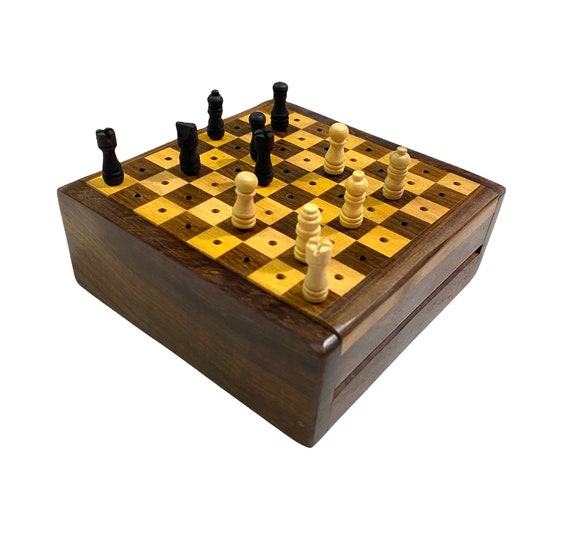 Compass and Chess Piece on Chess Board Game for Ideas, Challenge