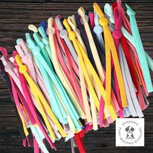 May include: A variety of colorful elastic cords with adjustable toggles. The cords are made of a soft, stretchy material and are perfect for making face masks or other crafts.