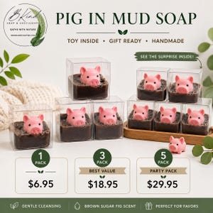 May include: Pink pig-shaped soaps in clear square boxes, presented as a 'Pig in Mud Soap' set. The soap is brown, and the packaging includes text that says 'Toy Inside', 'Gift Ready', and 'Handmade'. The set is available in 1, 3, and 5 packs.