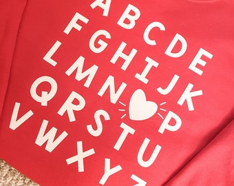 Alphabet Crewneck | Teacher Tee, Teacher Sweatshirt, Sweatshirt, Apparel, Valentine’s Day, Valentine’s