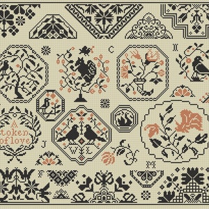 May include: A black and white cross-stitch sampler featuring a range of designs, including birds, flowers, and geometric patterns. The sampler includes the text "A token of love".