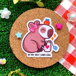 Pegatina linda de capibara para el cuidado personal