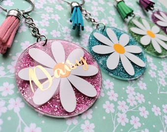 Llavero personalizado con nombre, margaritas, flores, llavero brillante de colores, bolsa de accesorios, etiqueta con nombre para la mochila escolar o deportiva de los niños, rellenos de stock