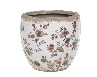 Può includere: Un vaso in ceramica bianca con finitura usurata e un motivo floreale in tonalità rosa, giallo e verde.
