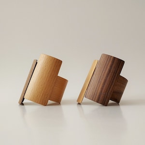 SUSU bracelets in a combination of walnut, oak and beech wood.