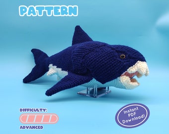 May include: A crocheted shark amigurumi pattern, labeled "PATTERN" and "DIFFICULTY: ADVANCED". The pattern is available for instant PDF download.