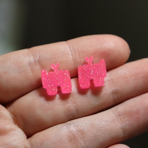 Pink Among Us Dead Crewmate Studs | Glittery Pink Dead Crewmate Resin Stud Earrings | Stainless Steel Posts | Glows in the Dark & UV Light