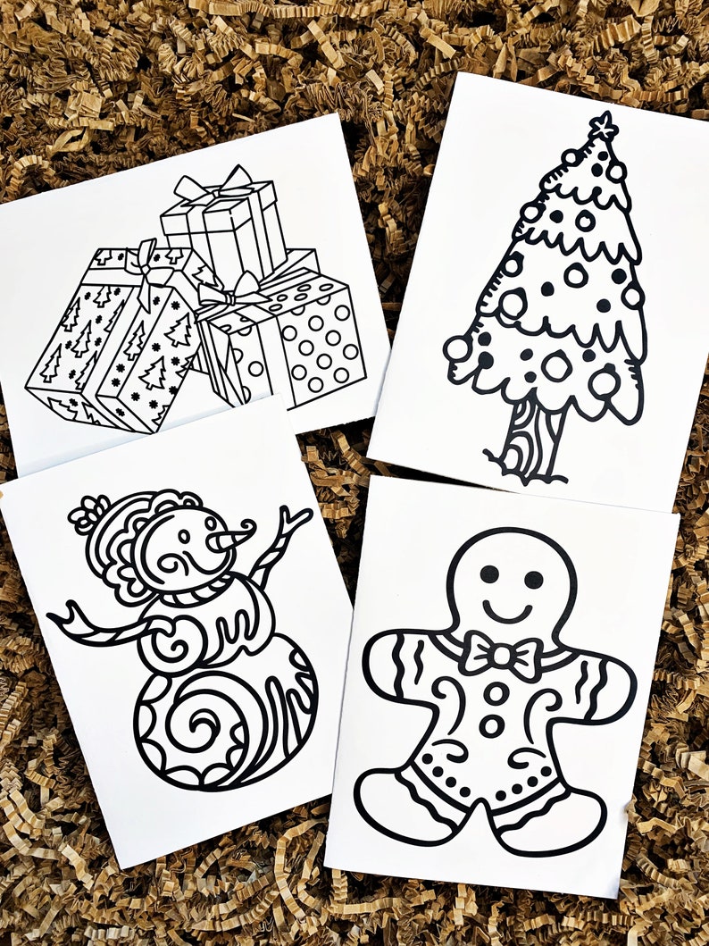 May include: Four black and white printable coloring cards featuring a Christmas tree, a snowman, a gingerbread man, and a stack of presents.