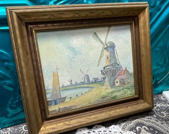 Vintage windmill landscape painting in aged wood frame