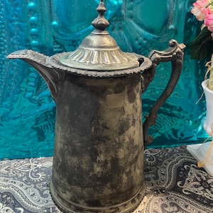 Antique ornate 1854 heavy silver plated or silver tone water pitcher - clearly showing its age