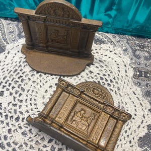 Antique small painted cast iron bookends- - aged