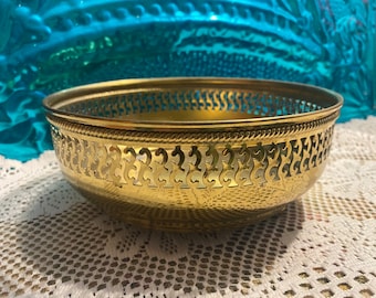 Vintage distressed brass or brass colored perforated bowl - showing it’s age