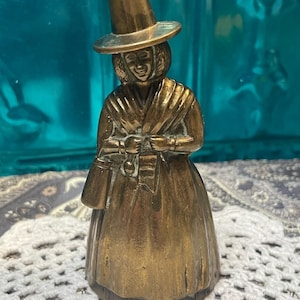 Vintage small but heavy Victorian style lady brass bell