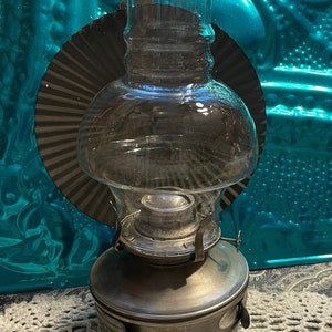 Vintage or antique metal oil- kerosene lamp with reflector and glass chimney- can hang or stand-  wick wheel not pushing up- aged