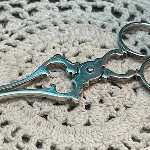 Antique- vintage small English silver or silver plated shell sugar tongs