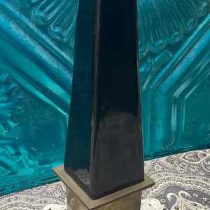 Vintage black obelisk 12.5 inches on brass base
