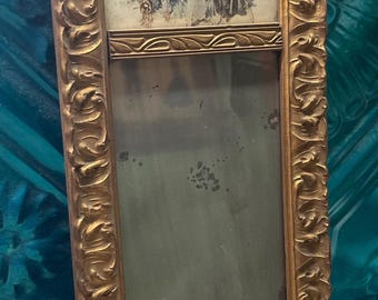 Antique ornate wood framed Victorian golf themed print and mirror clearly showing age and wear