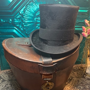 Antique Victorian felt top hat made in London in aged leather case - case showing age and wear