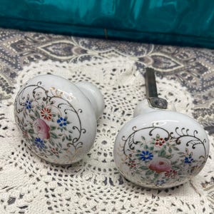 Vintage set of 2 ceramic floral painted door knobs