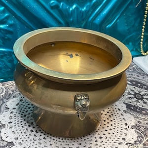 Vintage heavy pedestal bowl- planter- lion head or foo dog handles