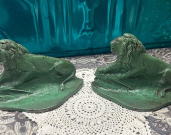 Antique- vintage 1928 painted metal lion bookends - showing their age