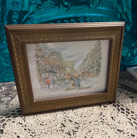 Vintage Paris print in aged frame with faux wicker details