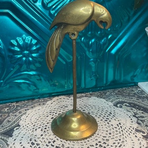 Vintage brass bird parrot on stand - missing perch- showing  age and wear
