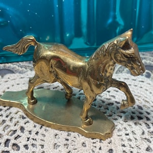 Vintage small brass horse - aged