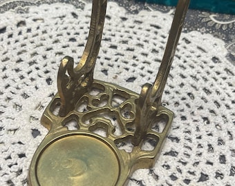 Vintage ornate cast brass cup and saucer stand - display