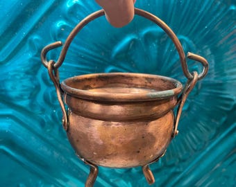 Antique or Vintage small hanging copper footed cauldron pot - does not stand straight- aged - imperfections