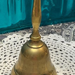 Vintage sturdy brass dinner bell - aged