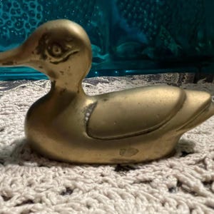 Vintage small brass duck - aged