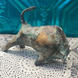 Vintage heavy cast iron Japanese bull sculpture- aged
