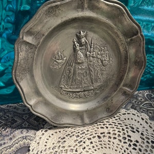 Vintage pewter wall plate with Madonna- ship- grapes