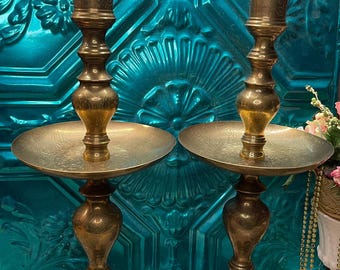 Vintage pair of  23.5  inches tall  brass altar candle holders with large trays - etched details