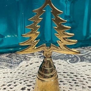 Vintage lightweight brass bell with Christmas tree