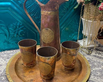 Vintage 15.5 inch diameter copper tray with pitcher and 3 cups - Aztec style brass accents- clearly showing age and wear