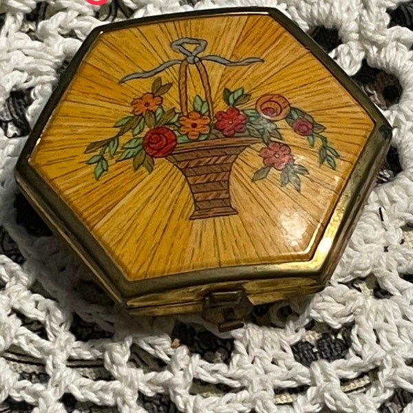 Vintage small powder compact - box - with mirror and powder puff - showing it’s age