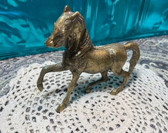 Vintage small but heavy unique brass horse - aged