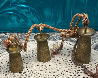 Vintage etched brass bells set of 3 on worn string