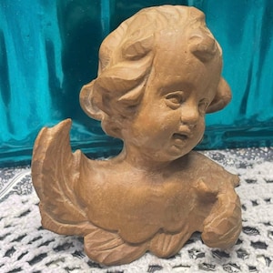 Vintage small carved wood- or wood look Italy cherub