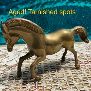 Vintage small brass horse - aged