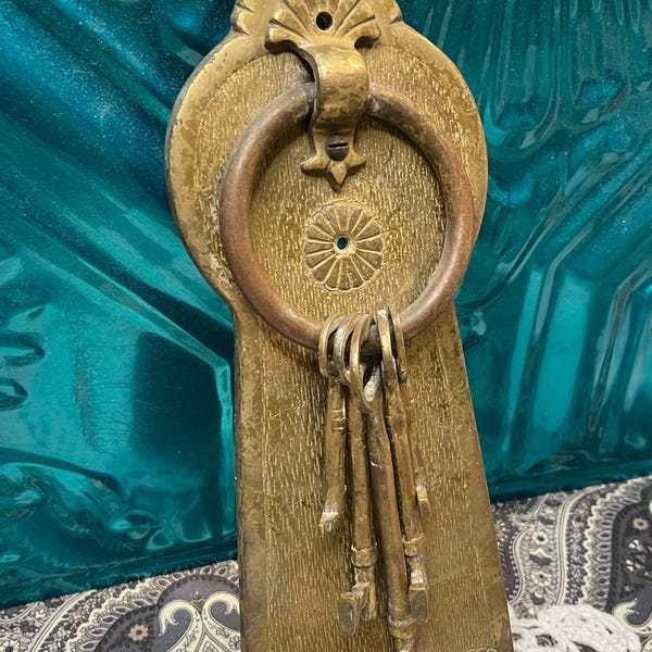 Vintage brass keyhole shaped door knocker with skeleton keys- aged