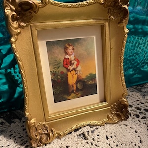 Vintage small Syroco style ornate plastic  frame with print of boy and dog- no glass