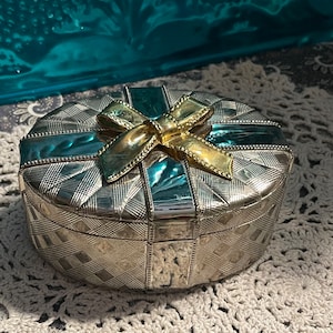 Vintage heavy gift shaped silver tone with gold tone bow- jewelry box- trinket box- velvet lining